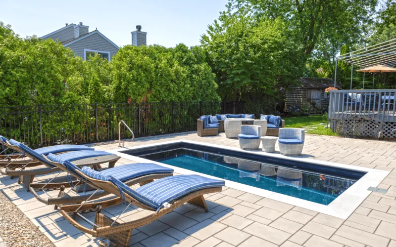 Inground pool with loungers - Puravida Custom Pools