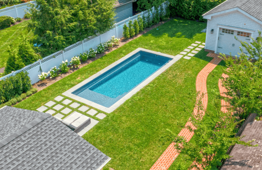Inground Swimming Pool Options: Gunite vs Fiberglass?