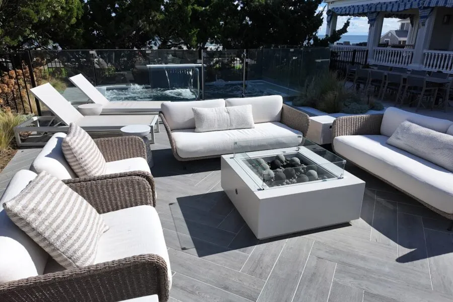 Cocktail pool behind outdoor seating - Puravida Custom Pools